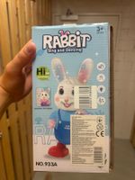 Spielzeug Hase singt und tanzt mit Trommel neu