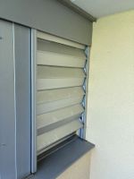 Elektrische(r) Sicherheitsfaltstore / Rollladen Stobag