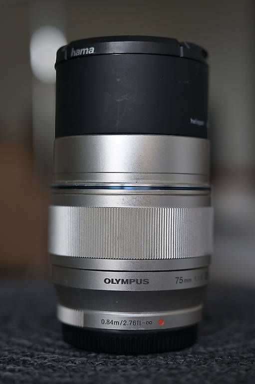 Olympus Obiettivi: Olympus / OM System 75mm f1.8 Objektiv – Usato da Dübendorf venduto da seadart 1