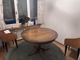 Runder Esstisch aus Holz ausziehbar gebrauchter Zustand
