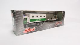 c1 Schuco 21864 Polizei LKW mit Rettungsboot