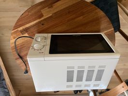 Voll funktionierende Mikrowelle