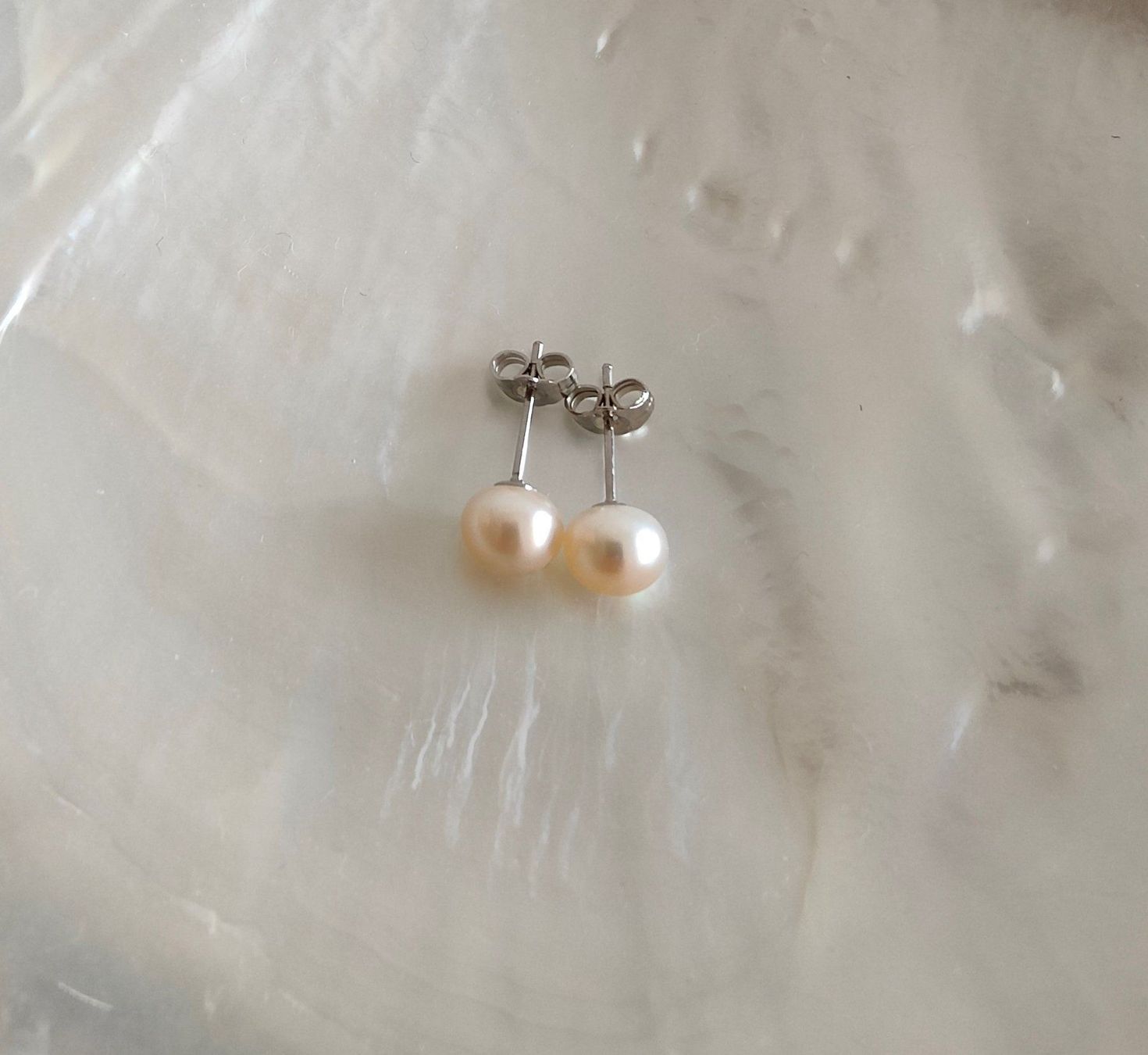 Orecchini pendenti & Orecchini a lobo: Süsswasserperle Ohrstecker 7mm, apricot – Nuovo e nell'imballaggio originale da Rümlang venduto da 21f 5