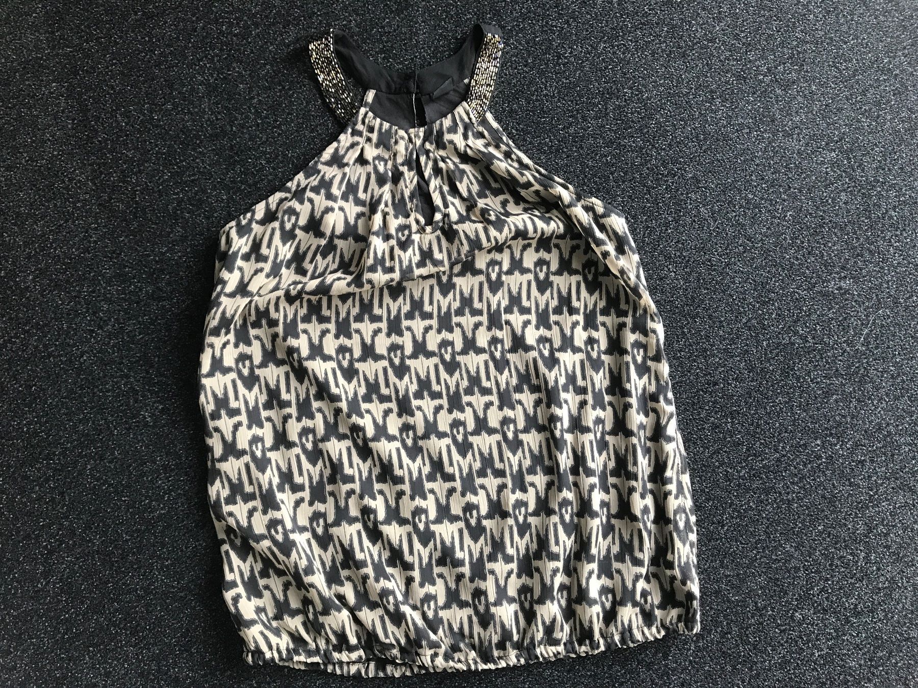 Zebra Top: Top Gr S mit Glitzerkragen – Usato da St. Margrethen SG venduto da kellenbh