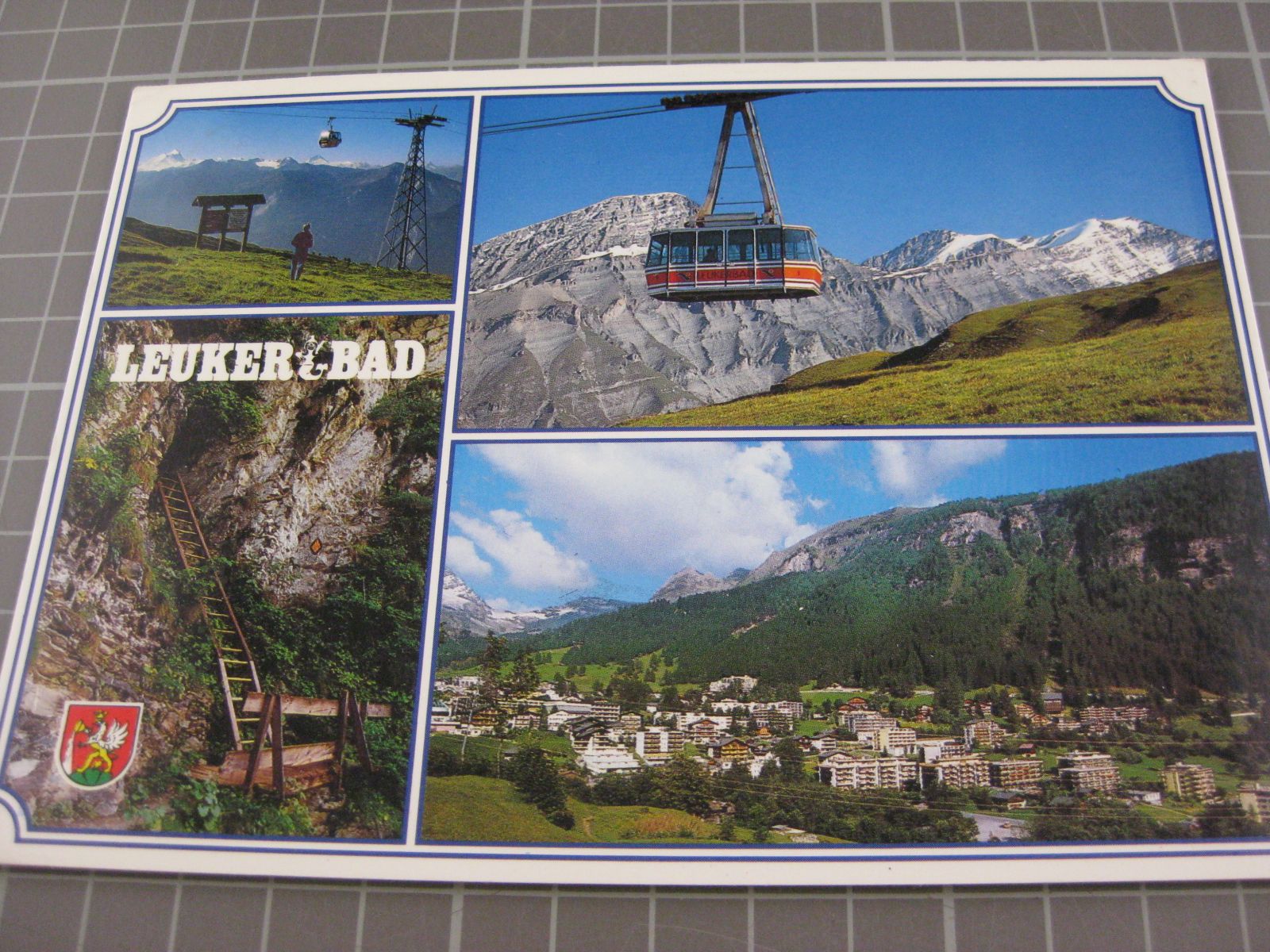 Cartoline postali: AK Leukerbad mit Luftseilbahn – Usato da Malters venduto da Marosko