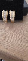Elegante goldene Ohrclips mit Strass - Glamour pur!