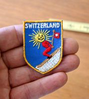 VINTAGE Badge SWITZERLAND sonne / skifahrer SGS klein