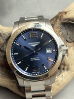 Montre Longines Conquest automatique cadran bleu 43mm
