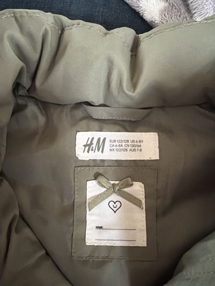 H&M Altro abbigliamento per bambina: Steppweste H&M 122/128 oliv – Usato da Au ZH venduto da schneebi88 1