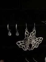 Set aus 2 silbernen Ohrringe