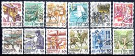 SERIE 12 MARKEN POSTBEFÖRDERUNG 1986-87 AUSGABETAG - NE07
