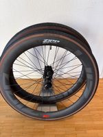 Zipp 303 XPLR SW Carbon-Laufradsatz Gravel LR + Reifen