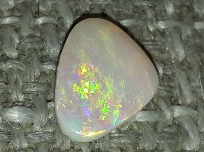 Pietre preziose: Australischer Flashfire Opal 0.47ct – Nuovo e nell'imballaggio originale da Uerkheim venduto da Winwinner 2