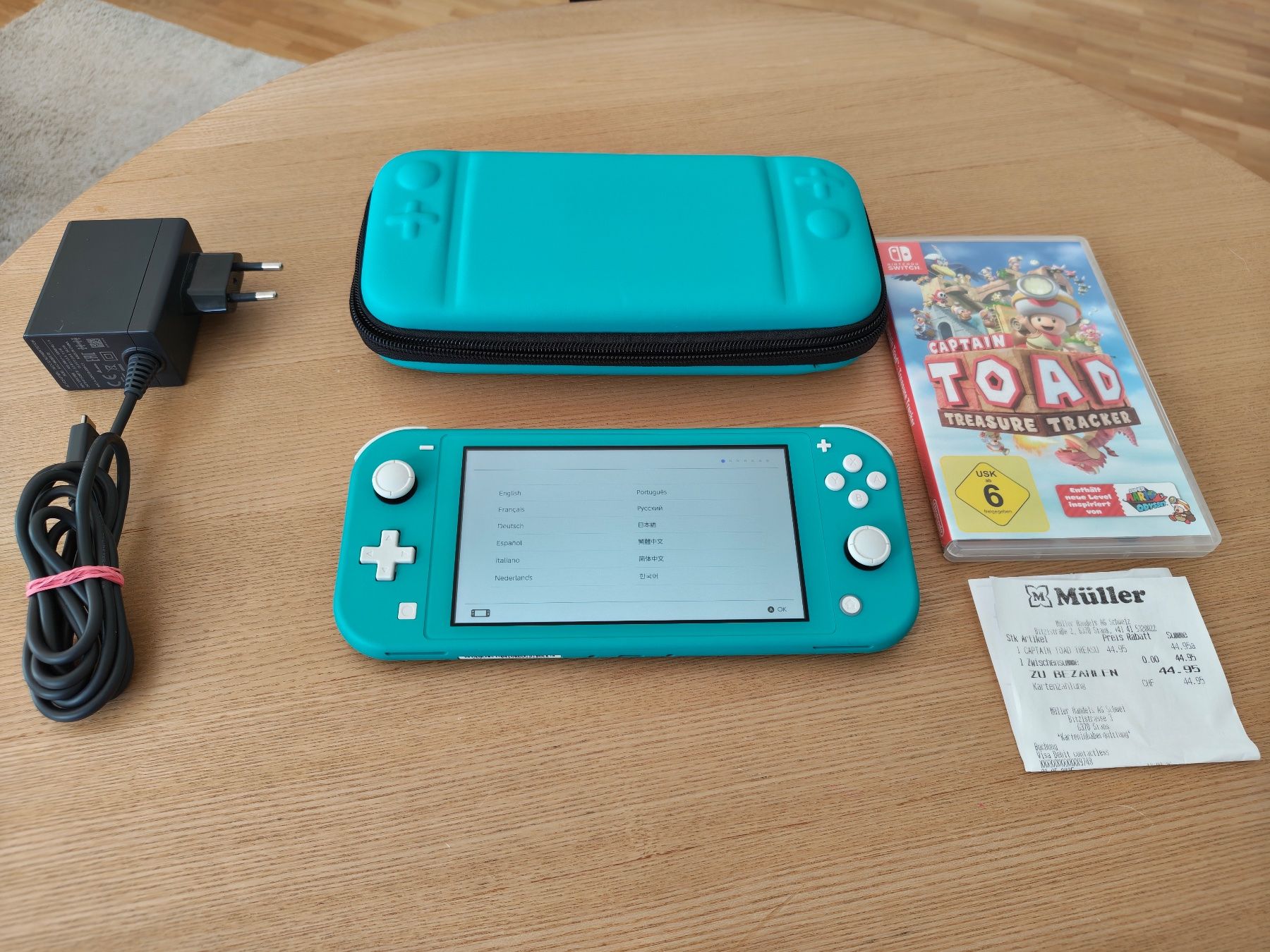 Nintendo Console: Nintendo Switch Lite Türkis inkl. Case & Game – Usato da Seuzach venduto da Mike79 1