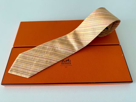 Cravate HERMES-Paris „Sunrays“ + petit box orange