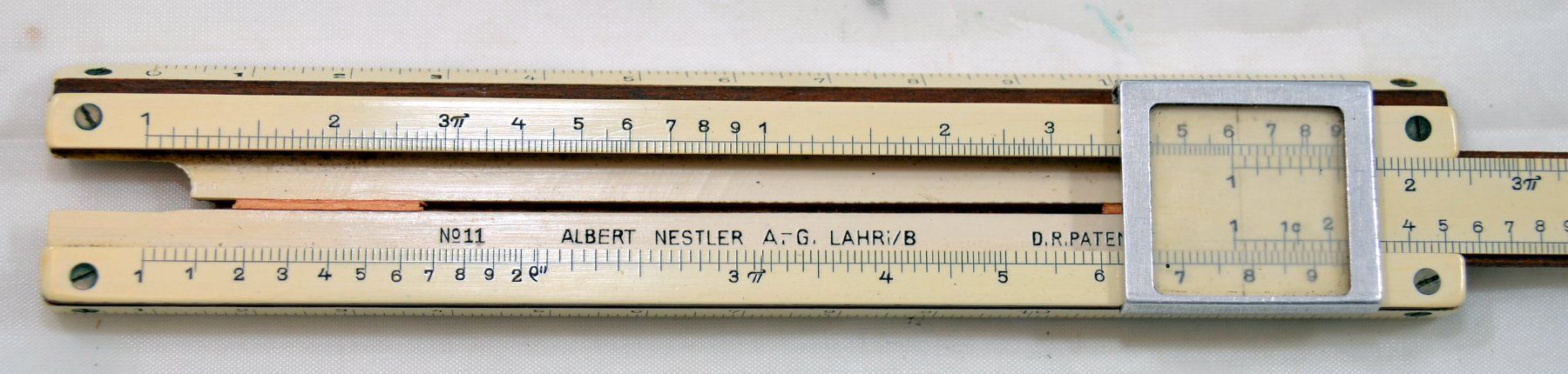 Taschenrechner: Rechenschieber Albert Nestler Nº 11 – Gebraucht aus Esslingen von  2