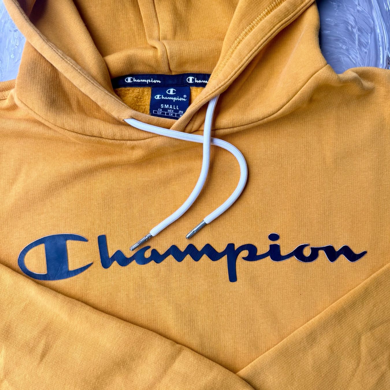 Champion Maglioni & Felpe: Sweat à Capuche Champion Jaune Moutarde – Usato da Thônex venduto da Suisse.Shopping 5