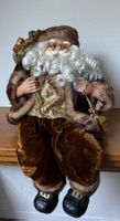 Sitzender Weihnachtsmann