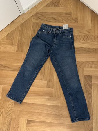 Jeans blau Grösse 34 mit Schlitz am Bein