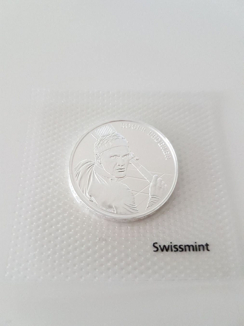 Tutti le monete: 1x Roger Federer 20 Fr. Münze – Nuovo e nell'imballaggio originale da Zürich venduto da Dr.Moony