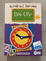 Die Uhr spielend lernen