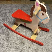 Schaukelpferd aus Holz für Kinder in gebrauchtem Zustand