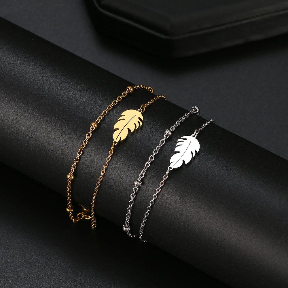 Armbänder & -reifen: Edelstahl Armband mit "Feder" Anhänger in GOLD – Neu und originalverpackt aus Tumegl/Tomils von Steinschleuder-Shop 1