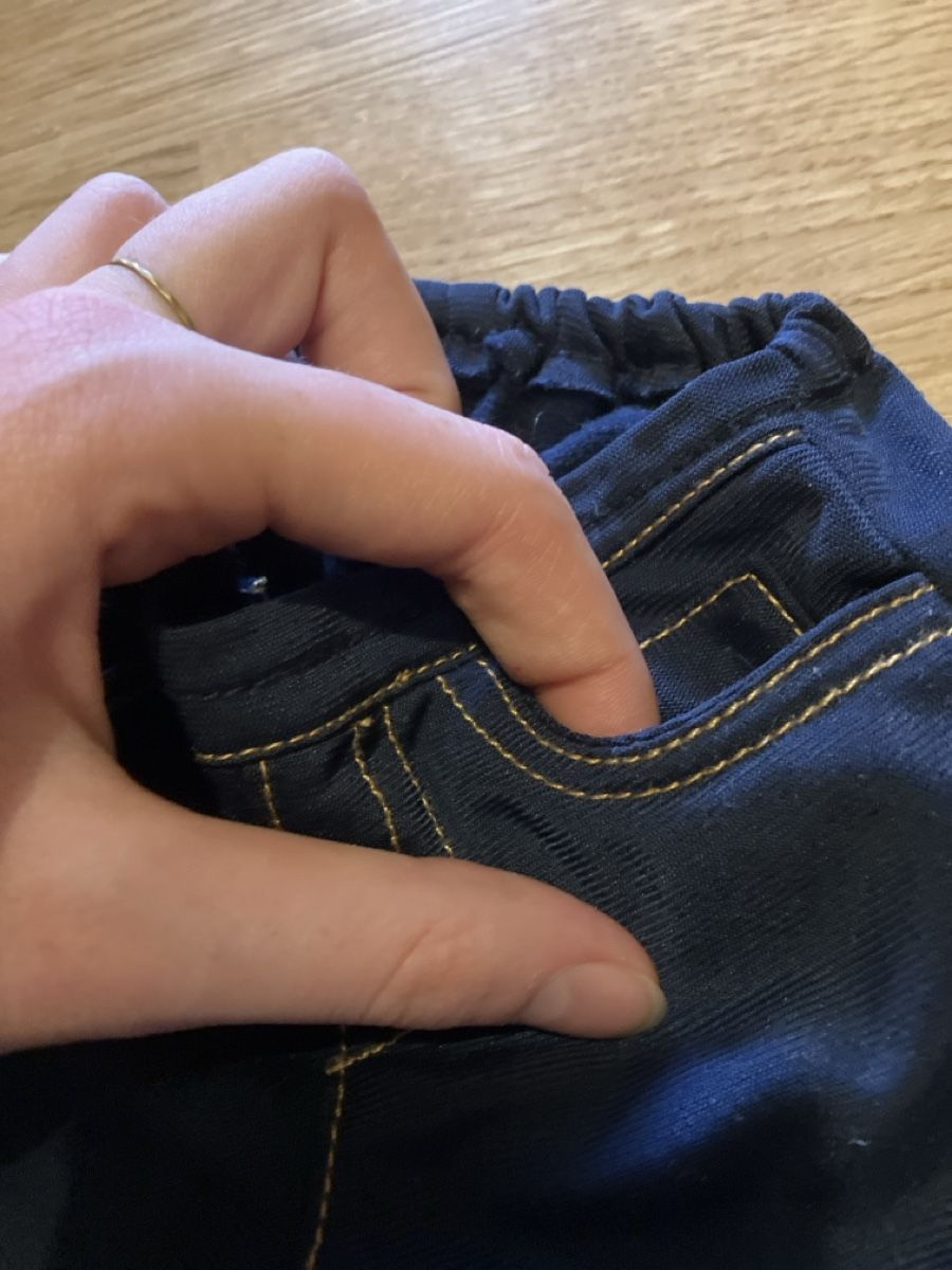 Bambole: Soft doll jeans in dark blue, pink inside – Usato da Zürich venduto da papperlapapp1 1