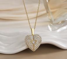 Collier cœur ouvrant doré avec cristaux état neuf