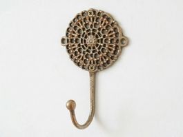 Patère murale vintage en bronze doré, décor dentelle