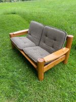 Rustikales 2er Sofa aus massivem Holz