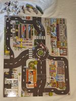 Puzzle-Stadt Strassenpuzzle mit Spielfiguren