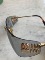 Paire de lunettes Miu Miu