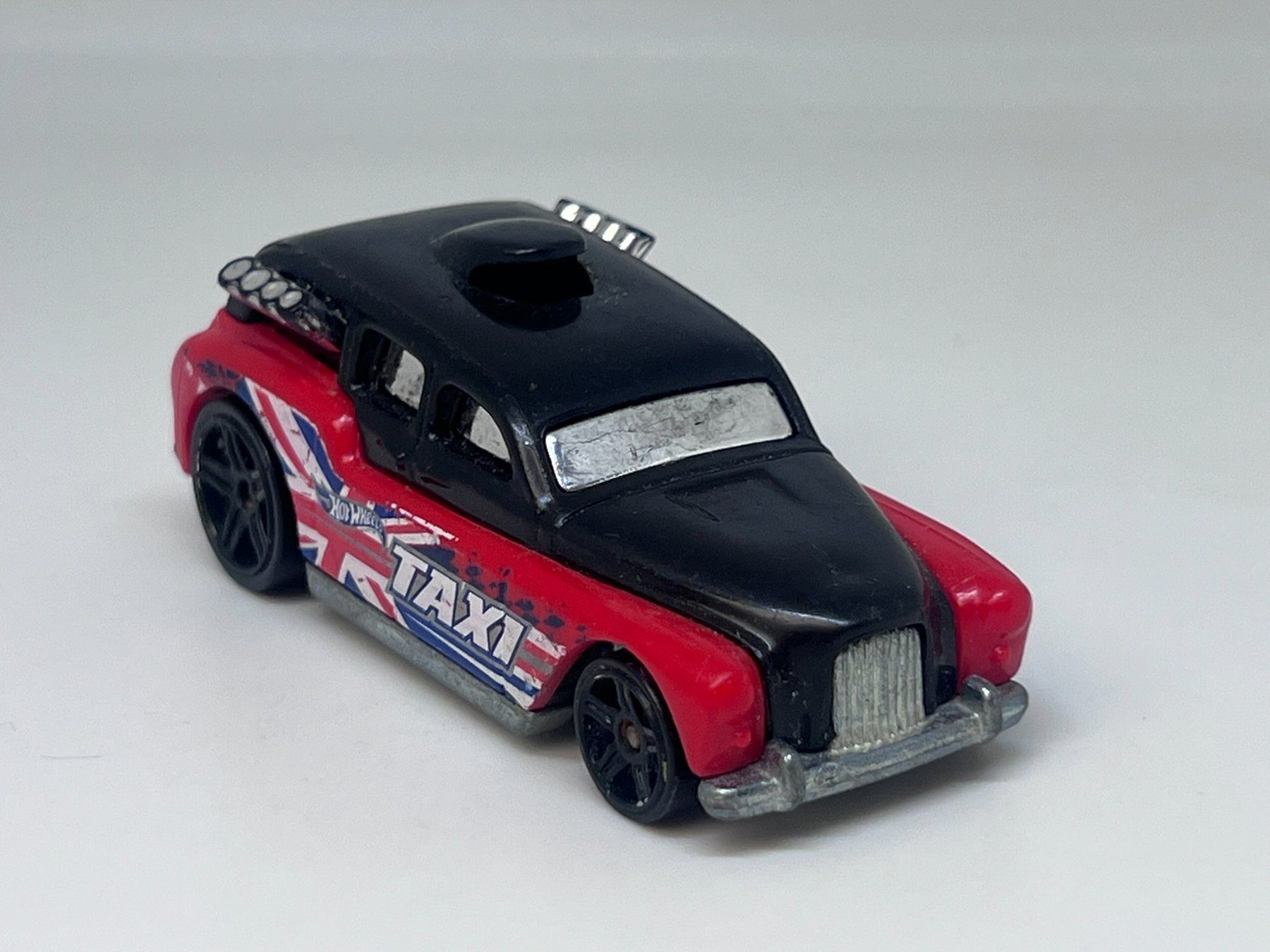 Hot Wheels Modellini d'auto: Hot Wheels Cockney Cab II #470 – Usato da Wildegg venduto da LaaBoutique