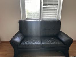 Black leather 2-seater sofa