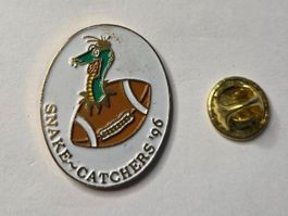 Pin's SNAKE-CATCHERS 1996 mascotte foot US vintage collector
