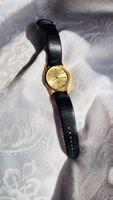 Armbanduhr Sonata goldfarben mit schwarzem Lederarmband