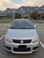 Suzuki SX4 silber Gebrauchtwagen mit sichtbaren Mängeln