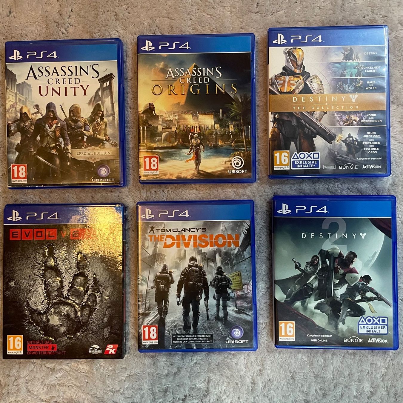 Sony Giochi: PS4 Spiele Sammlung Bundle Assassin’s Creed Destiny Evolve – Usato da Bubikon venduto da SwissSecondLife
