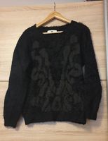 Flauschiger Pullover von ammA+Rachel