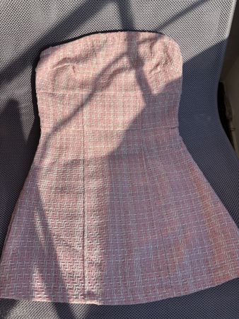 Pink tweed strapless dress with bow