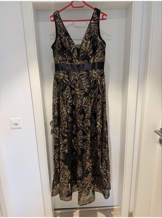 Robe de soirée longue noire et dorée bon état