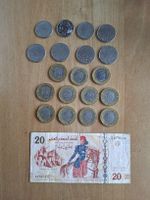 Münzen und Banknote aus Tunesien