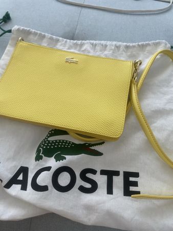 Sac Lacoste neuf avec bandoulière.jaune