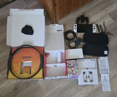 Nintendo Switch OLED + Jeux + accessoires – Très bon état