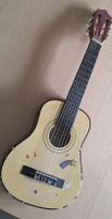 kinder spiel gitarre