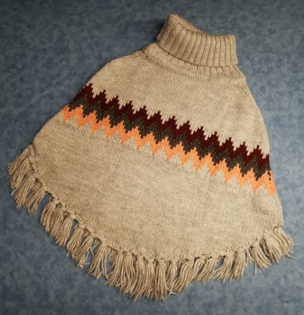 Poncho, 134/152
