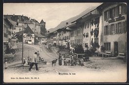 Gruyères, Einwohner auf einem Platz mit