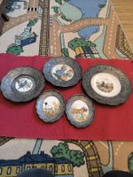 5 Zinn Wandteller mit Jagd- und Blumenmotiven