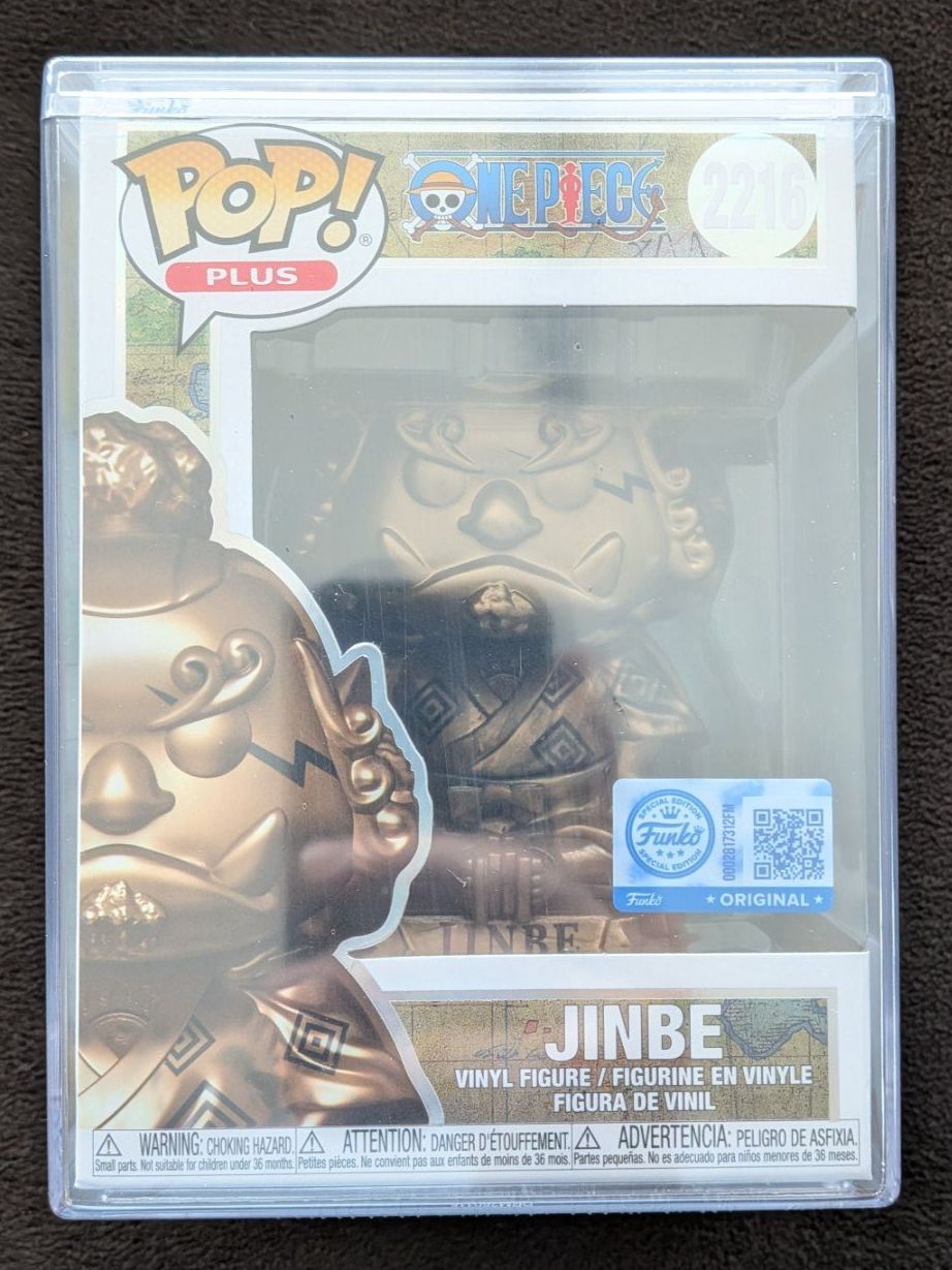 Funko Figuren: Funko Pop! One Piece - Jinbe Bronze #2216 in Hard Case – Neu und originalverpackt aus Obfelden von RCO85